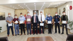 EVCİLER KAYMAKAMI ABDULLAH YÜKSEL PERSONELE BAŞARI BELGESİ VERDİ