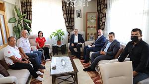 ULUÇAY VE YURDUNUSEVEN’DEN BAŞARILI TEKVANDOCUYA TEBRİK ZİYARETİ