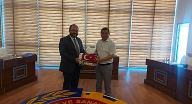 Ticaret ve Sanayi Odası Yönetim Kurulu Üyesi Hayrettin Güzbey’i ziyaret ettiler.