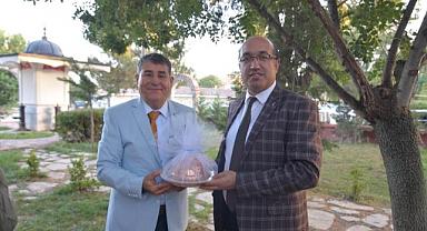 İLÇE KAYMAKAMINA VEDA YEMEĞİ DÜZENLENDİ