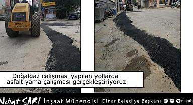 Dinar İlçesinde doğalgaz çalışması yapılan yollara belediyemiz asfalt yaması yapıyor