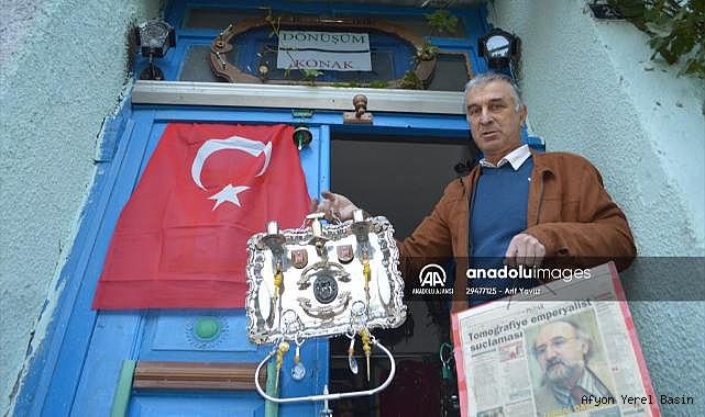 Emekli makinist, hurdalardan dönüştürdüğü eserleri kiraladığı konakta sergiliyor