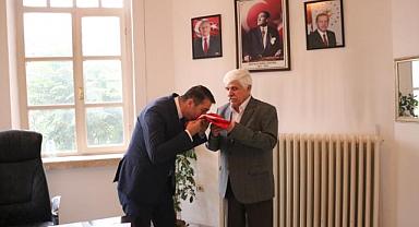 Dr. Ersan Özgür, Kent Konseyi Başkanı Yasan’ı ziyaret etti