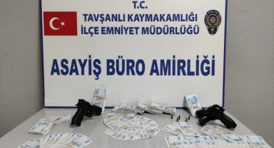 Kütahya'da piyasaya sahte para sürdüğü iddia edilen 2 şüpheli yakalandı