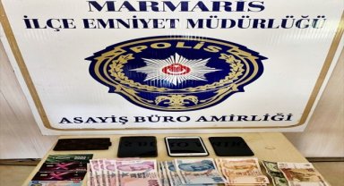 Marmaris'te sahildeki çantaların çalınması güvenlik kamerasında