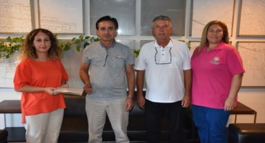 Aydın'da bağışlanan pantolonda bulunan para sahibine teslim edildi