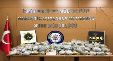 İzmir'de bir tırın yakıt deposunda 57 kilo 900 gram esrar ele geçirildi