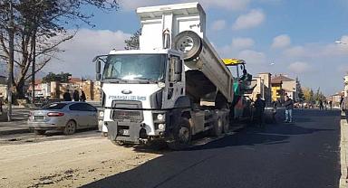 SULTANDAĞI SICAK ASFALTA KAVUŞUYOR.